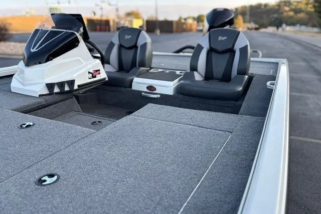 Slide: The Image of 2025 Ranger ALPHA 208 boat interior with sleek seating and modern dashboard design. - 34