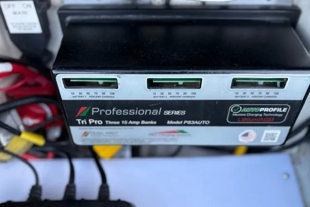Slide: The Image of Battery charger with three 15 Amp banks, Ranger ALPHA 208, 2025 model. - 66