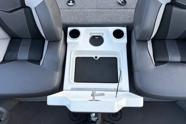 Slide: The Image of Interior of 2025 Ranger ALPHA 208 boat with seating and cup holders. - 46