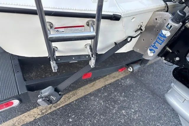 Slide: The Image of Rear view of a 2025 Ranger ALPHA 208 boat with ladder and secure straps. - 64