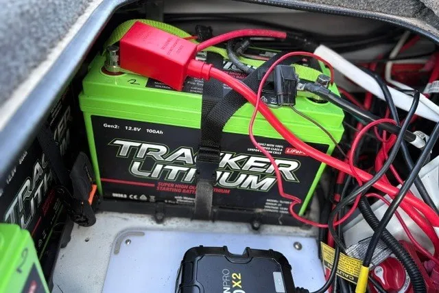 Slide: The Image of 2025 Ranger ALPHA 208 with Tracker Lithium battery setup, featuring red and black cables. - 67