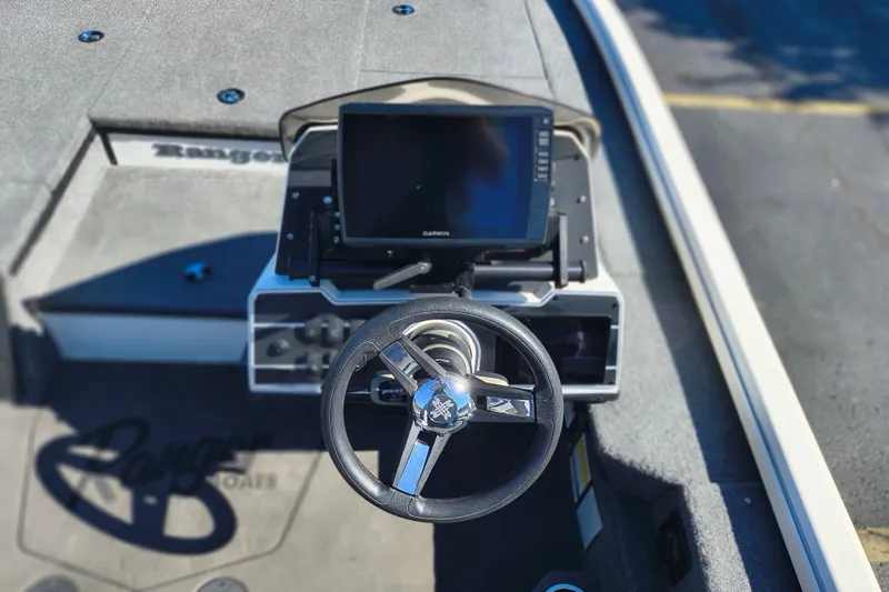 Slide: The Image of Steering console of 2025 Ranger ALPHA 208 boat with navigation display. - 23