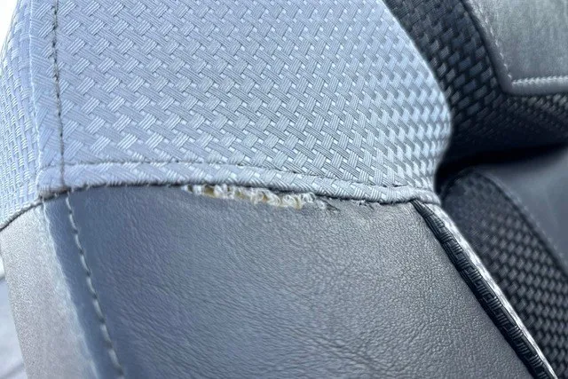 Slide: The Image of Close-up of 2025 Ranger ALPHA 208 car seat with visible stitching detail. - 32