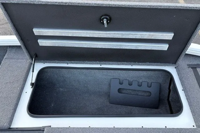 Slide: The Image of Storage compartment of 2025 Ranger ALPHA 208 boat, featuring organized interior space. - 60