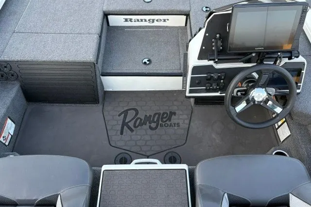 Slide: The Image of 2025 Ranger ALPHA 208 boat interior with steering wheel and dashboard display. - 39