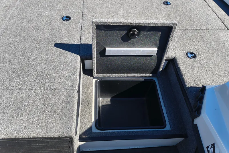 Slide: The Image of Open storage compartment on 2025 Ranger ALPHA 208 boat deck. - 13