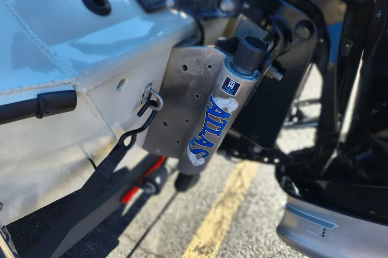 Slide: The Image of Close-up of Ranger ALPHA 208 boat component, featuring Atlas hydraulic system, 2025 model. - 29