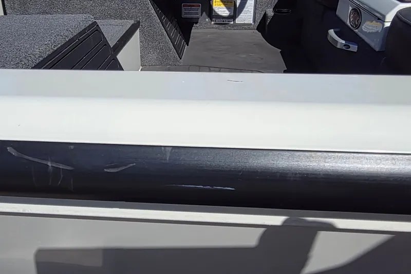 Slide: The Image of Interior view of 2025 Ranger ALPHA 208 boat, featuring seating and storage compartments. - 44