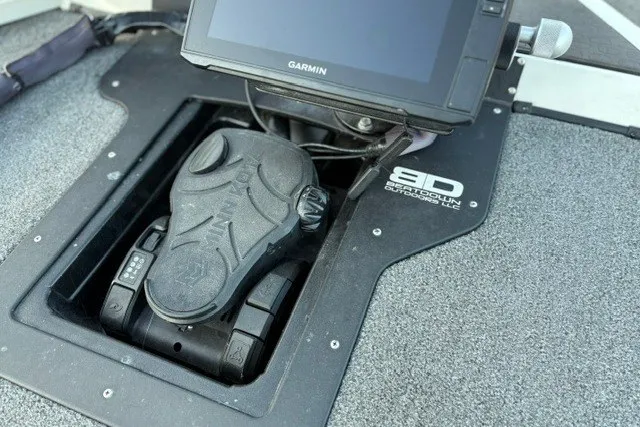 Slide: The Image of Foot pedal control and Garmin display on 2025 Ranger ALPHA 208 boat. - 62