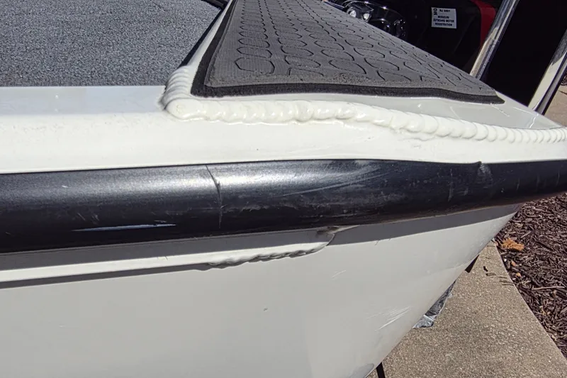 Slide: The Image of Close-up of 2025 Ranger ALPHA 208 boat's edge with textured mat and weld detail. - 45