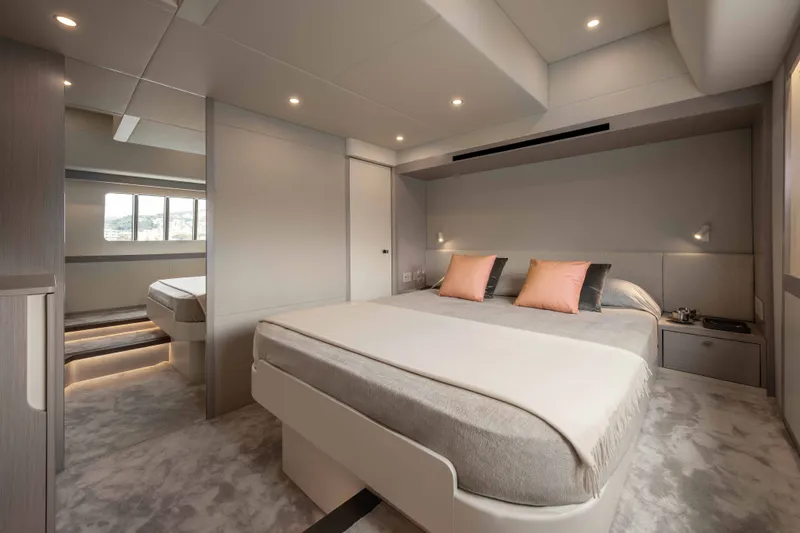 Slide: The Image of Luxurious cabin of the Absolute Navetta 50 with modern design and soft lighting features. - 14