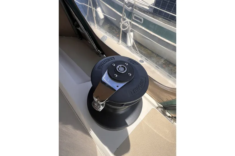 Slide: The Image of Sailing winch on a 1991 Perry 51 yacht deck, with clear view of surroundings. - 34