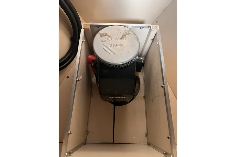 Slide: The Image of 1991 Perry 51 engine compartment with visible components and wiring. - 112