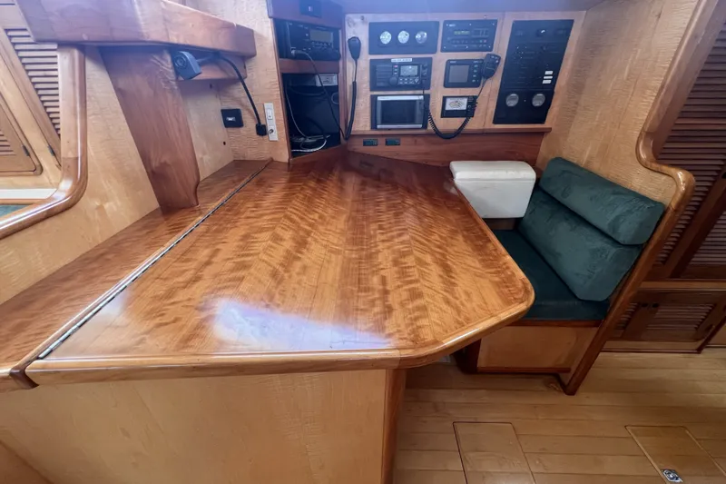 Slide: The Image of Luxurious wooden interior of a 1991 Perry 51 yacht with navigation equipment. - 67