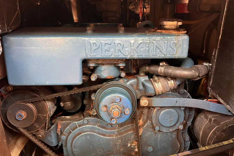 Slide: The Image of Close-up of a vintage 1991 Perry 51 engine with visible Perkins branding. - 101