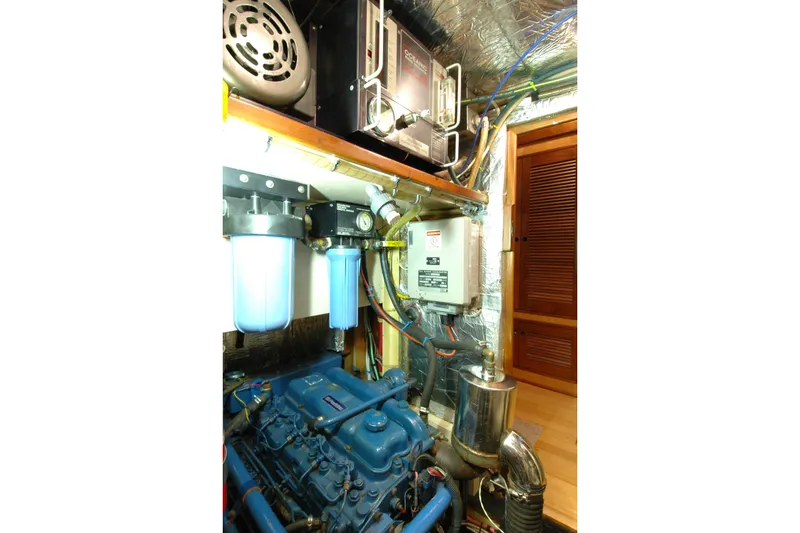 Slide: The Image of Engine room of a 1991 Perry 51 yacht with filtration system and equipment. - 96