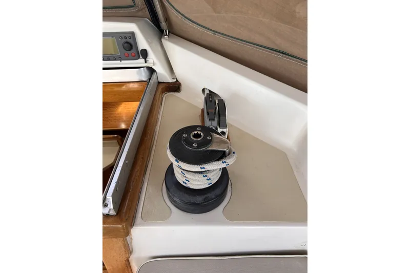 Slide: The Image of Sailboat winch with rope on a 1991 Perry 51 yacht deck. - 43