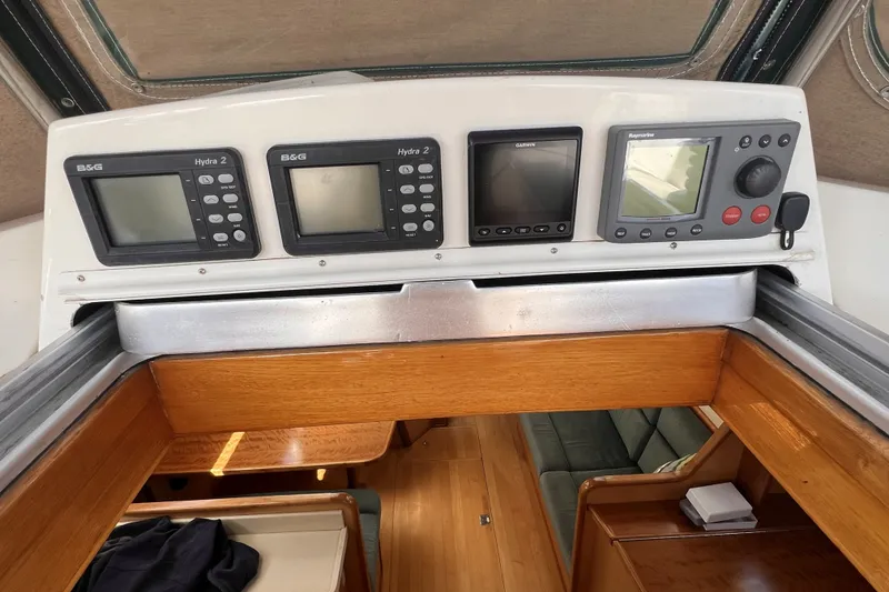 Slide: The Image of Control panel of a 1991 Perry 51 yacht with navigation instruments. - 36