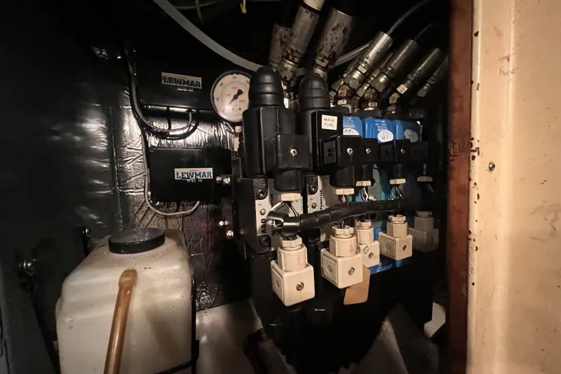 Slide: The Image of Hydraulic system components in a 1991 Perry 51 boat engine room. - 103