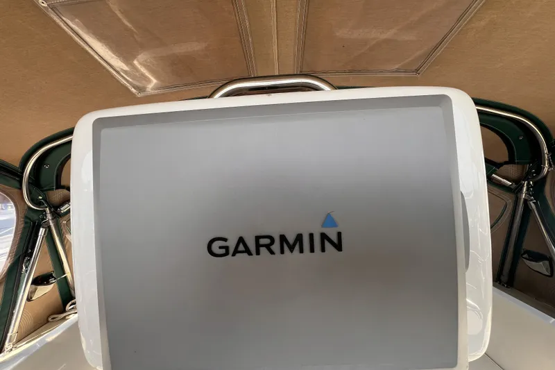 Slide: The Image of Garmin navigation system inside a 1991 Perry 51 boat cockpit. - 39