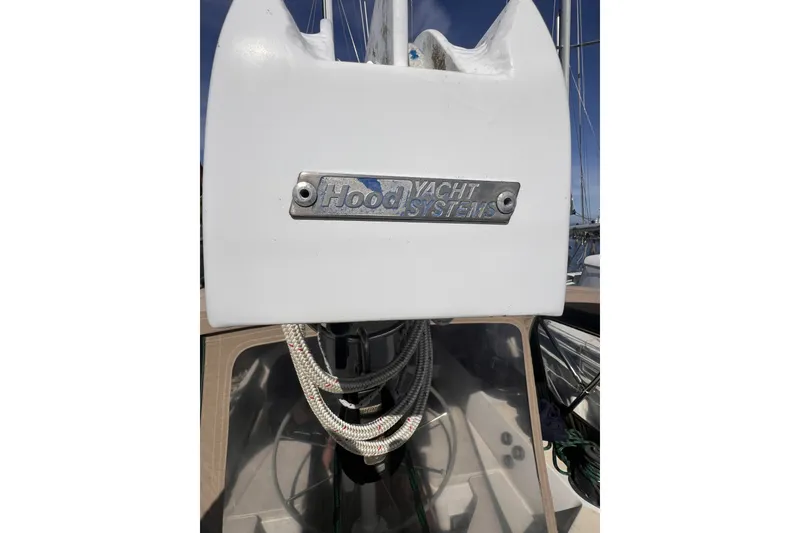 Slide: The Image of Hood Yacht Systems equipment on 1991 Perry 51 sailboat, featuring ropes and rigging. - 32