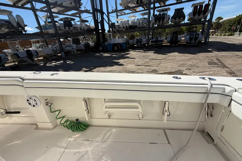 Slide: The Image of 2015 Jupiter 34 FS boat interior with docked vessels in the background. - 29