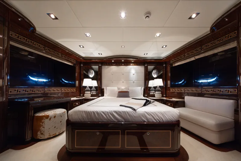 Slide: The Image of Luxurious bedroom interior of 2009 Mangusta 165 yacht with elegant decor and ambient lighting. - 40