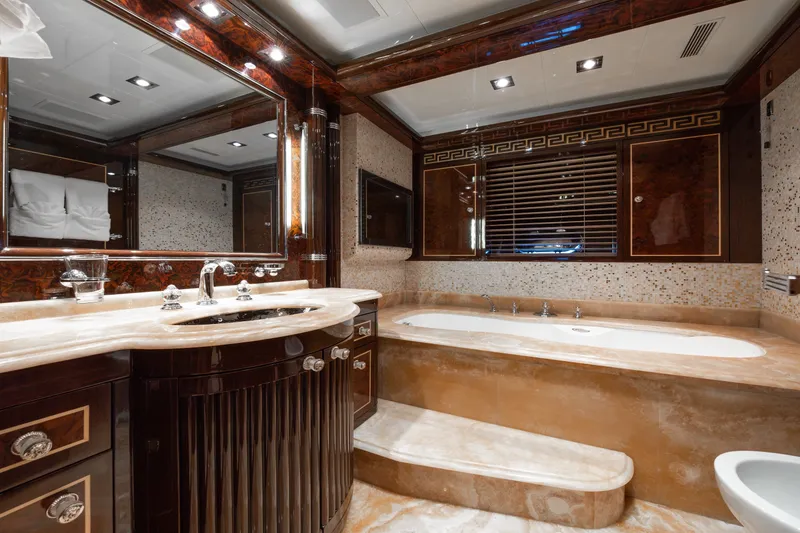 Slide: The Image of Luxurious bathroom in 2009 Mangusta 165 yacht with marble finishes and elegant fixtures. - 42