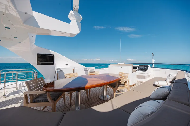 Slide: The Image of Luxurious deck of 2009 Mangusta 165 yacht with seating and ocean view. - 60