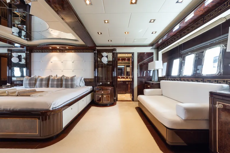 Slide: The Image of Luxurious interior of 2009 Mangusta 165 yacht with elegant bedroom and seating area. - 30