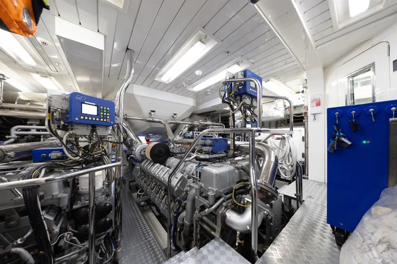 Slide: The Image of Engine room of 2009 Mangusta 165 yacht, featuring advanced machinery and control systems. - 64