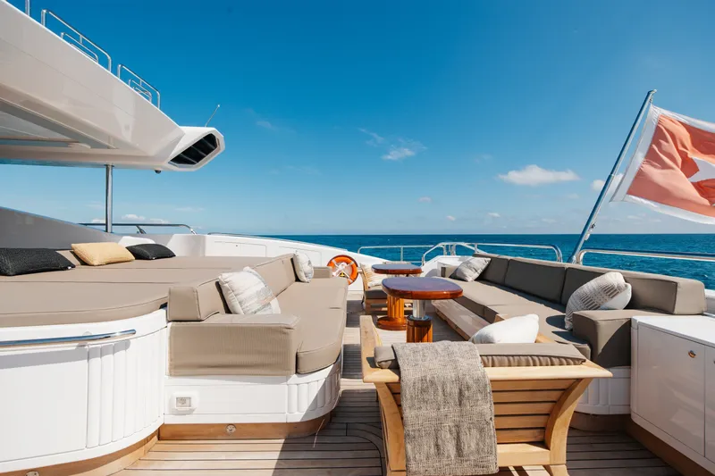 Slide: The Image of Luxurious deck of 2009 Mangusta 165 yacht with elegant seating and ocean view. - 17