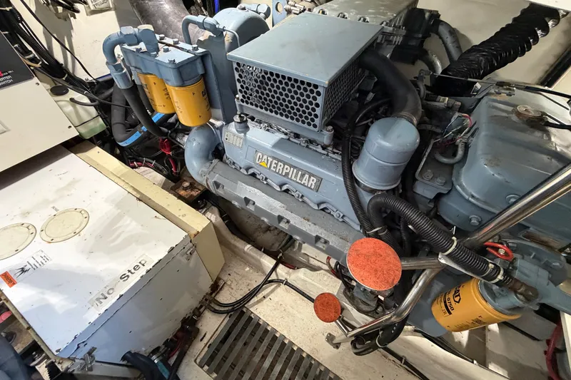 Slide: The Image of Engine room of a 1998 Tiara Yachts 4000 Express with Caterpillar engine. - 25