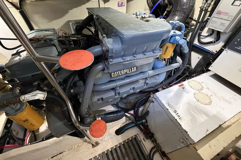 Slide: The Image of Engine room of a 1998 Tiara Yachts 4000 Express with Caterpillar engine. - 27