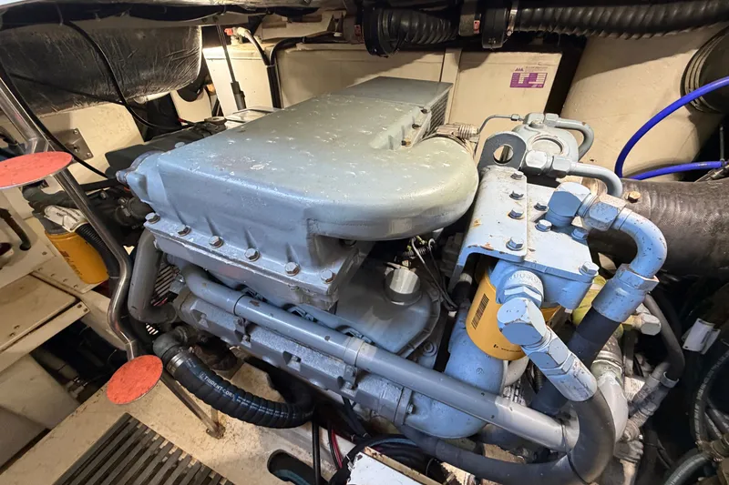 Slide: The Image of Engine room of a 1998 Tiara Yachts 4000 Express, showcasing mechanical components. - 29