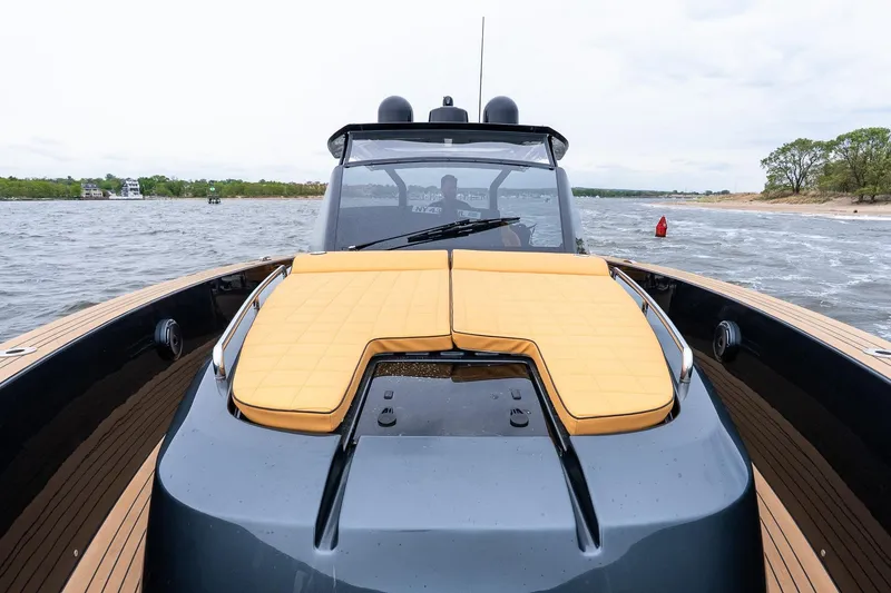 Slide: The Image of 2025 Pardo Yachts 43 with sleek design and luxurious deck cushions on open water. - 36