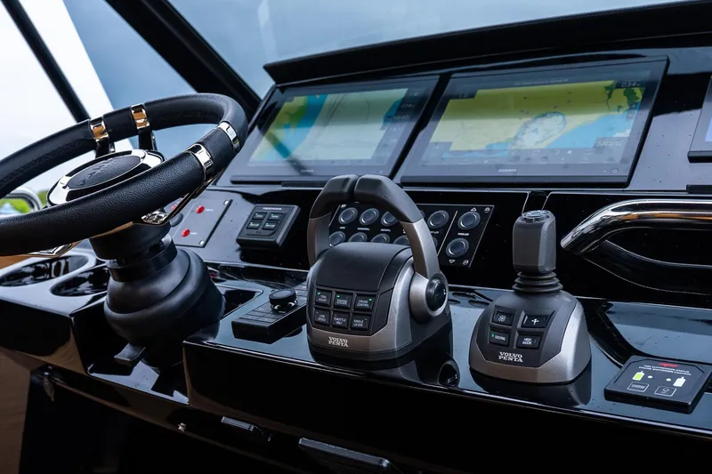 Slide: The Image of Cockpit of 2025 Pardo Yachts 43 with advanced navigation controls and displays. - 32