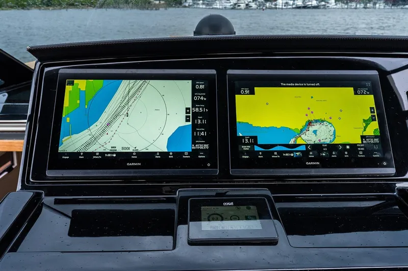 Slide: The Image of Navigation screens on a 2025 Pardo Yachts 43, displaying detailed marine charts. - 31