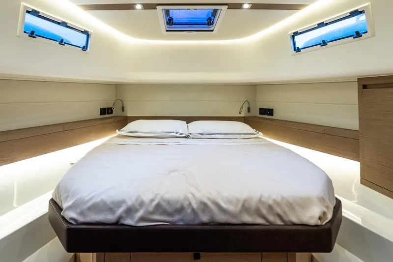 Slide: The Image of Luxurious cabin interior of 2025 Pardo Yachts 43, featuring a cozy bed and modern design. - 47