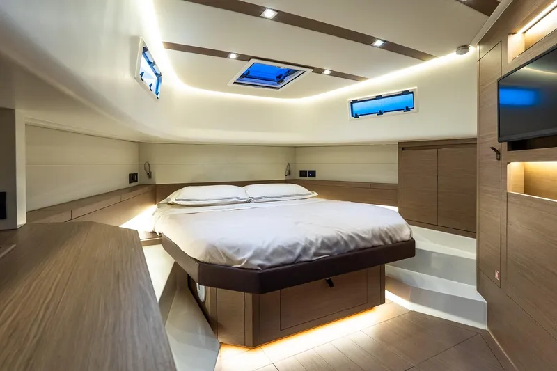 Slide: The Image of Luxurious interior cabin of 2025 Pardo Yachts 43, featuring modern design and ambient lighting. - 48