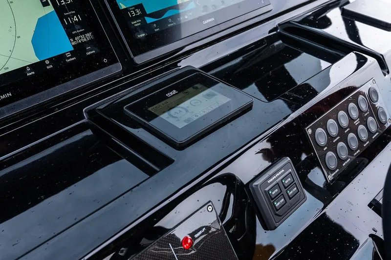 Slide: The Image of Dashboard of 2025 Pardo Yachts 43 with navigation and control panels. - 34