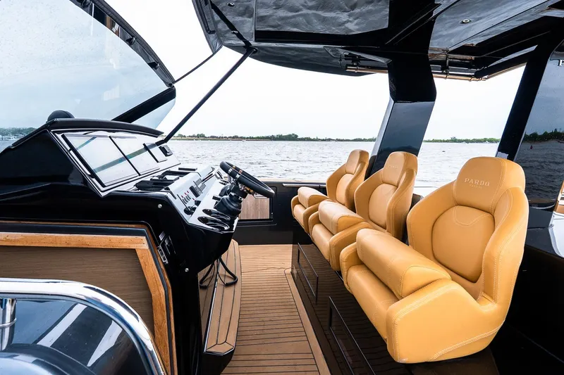 Slide: The Image of Luxurious interior of 2025 Pardo Yachts 43 with plush seating and sleek dashboard. - 23