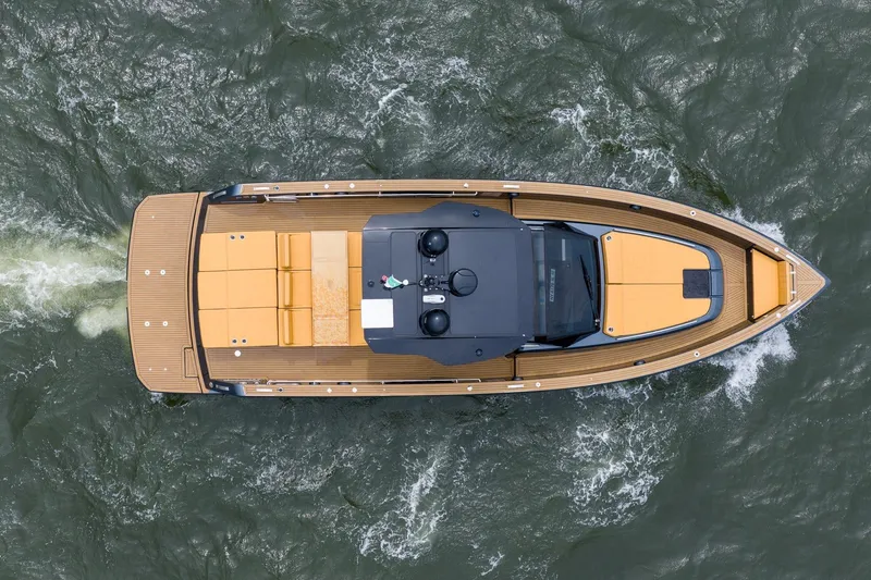 Slide: The Image of Overhead view of 2025 Pardo Yachts 43 cruising on water. - 40