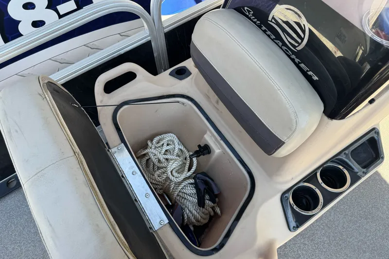 Slide: The Image of 2019 Sun Tracker Bass Buggy 18 DLX boat seat storage with rope and cup holders. - 15