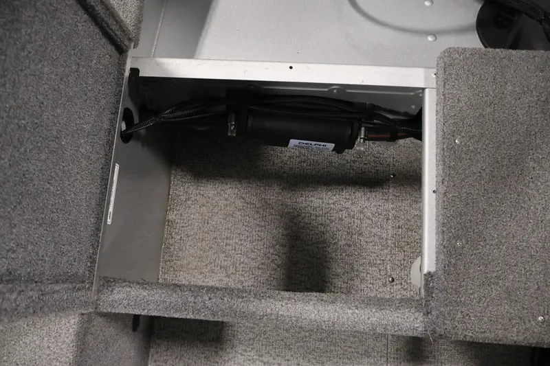 Slide: The Image of Interior view of a 2015 Alumacraft Classic 165 Tiller boat compartment. - 26
