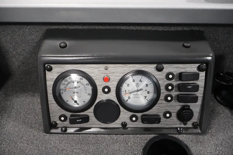 Slide: The Image of Dashboard of 2015 Alumacraft Classic 165 Tiller with speedometer and RPM gauges. - 24