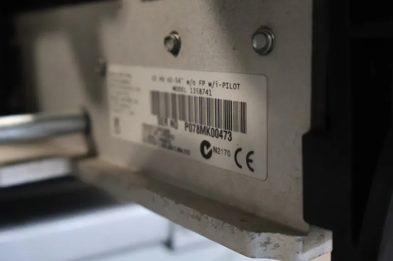 Slide: The Image of Label on Alumacraft Classic 165 Tiller 2015, showing model and serial number details. - 14