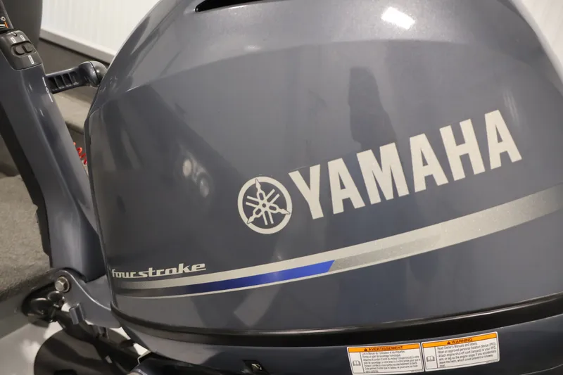 Slide: The Image of Yamaha four-stroke engine on 2015 Alumacraft Classic 165 Tiller boat. - 28