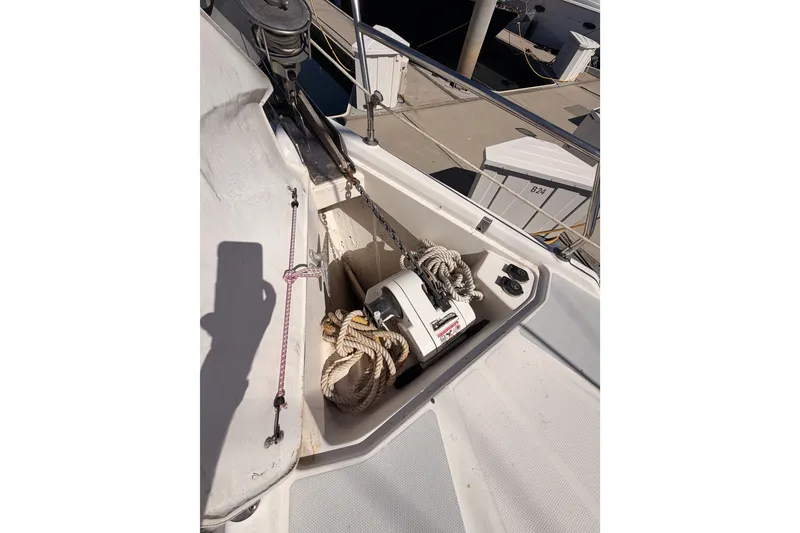 Slide: The Image of Anchor locker of a 2002 Hunter 460 sailboat with ropes and winch. - 13