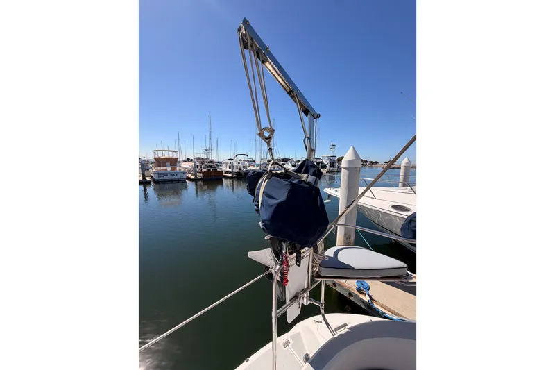 Slide: The Image of Sailboat Hunter 460 (2002) docked at marina with clear blue sky. - 26